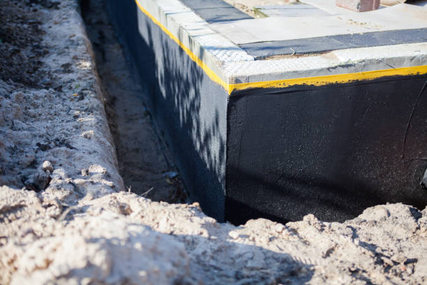 Professional Emergency Waterproofing technician working in Sumava Resorts, IN